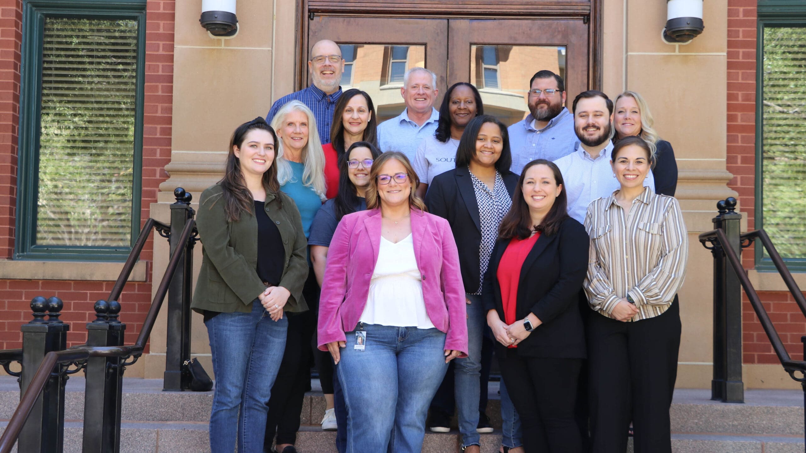 Photo of employees smiling